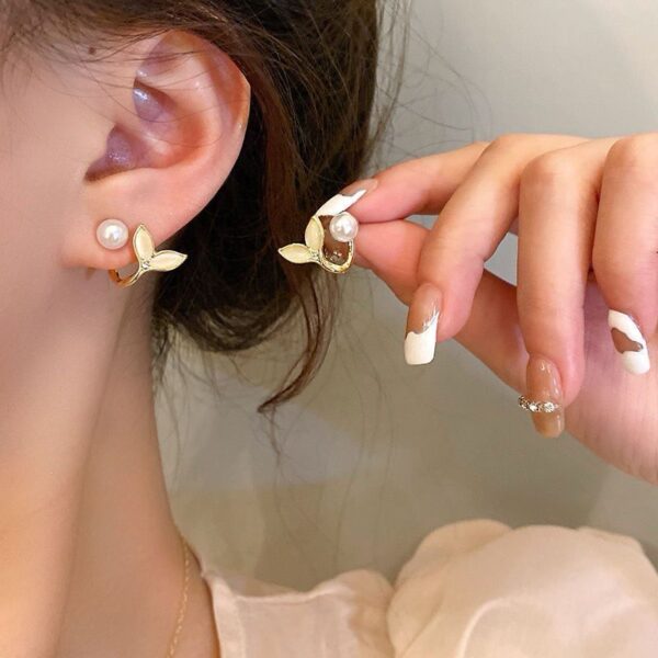 elegant pearl tail earrings
